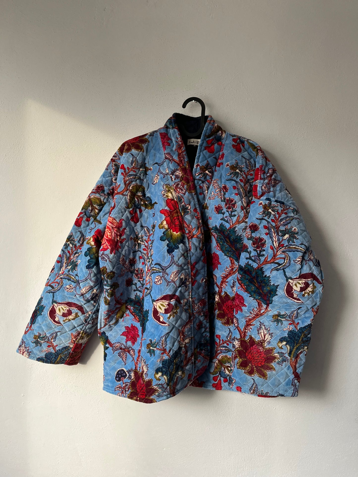 Giacca puro velluto stampata azzurra.