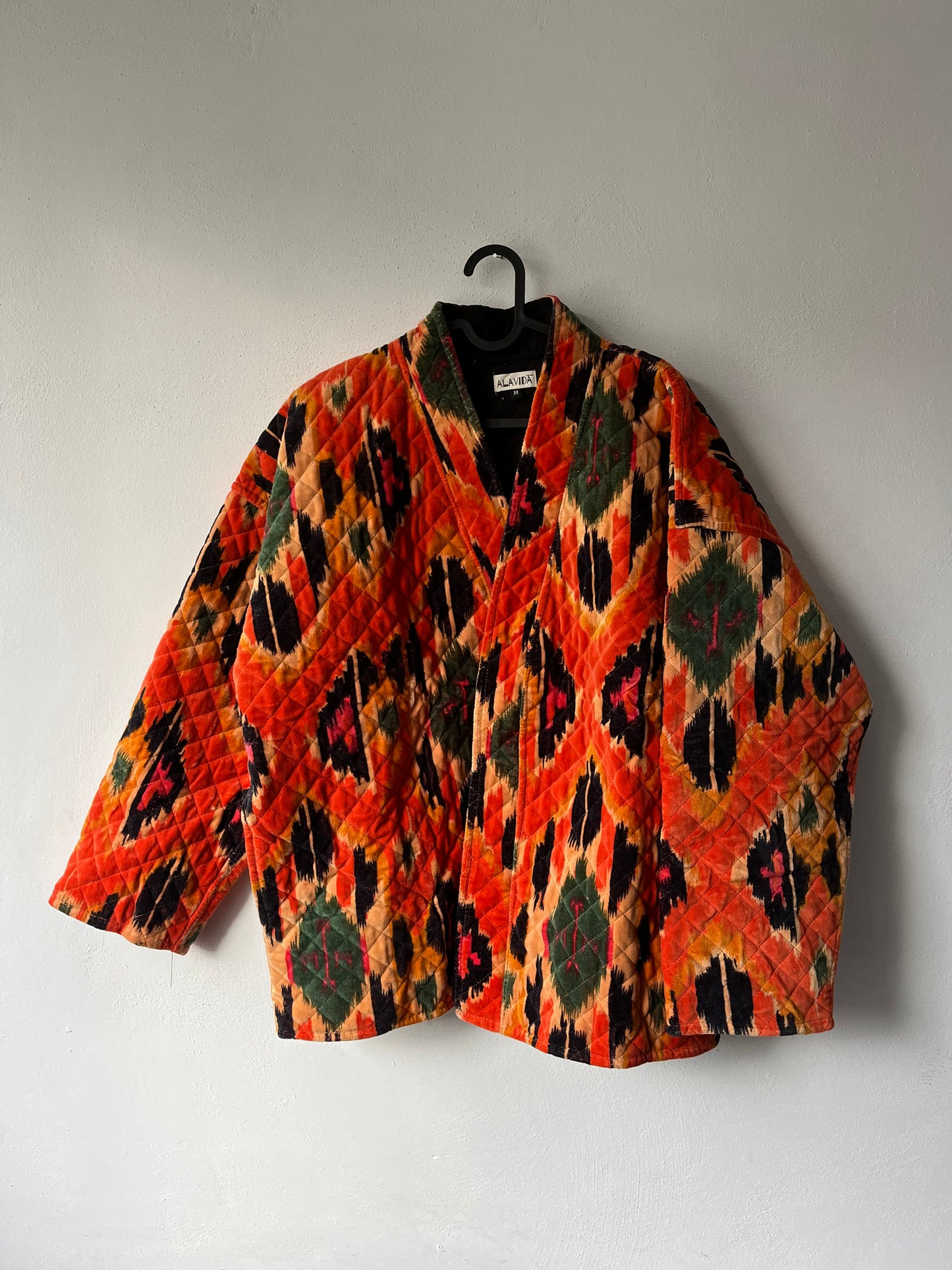 Giacca velluto stampata arancione.