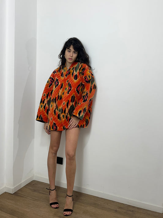 Giacca velluto stampata arancione.